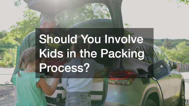 kids helping their dad pack and load things